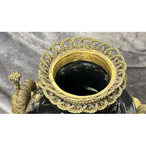 42 - A LARGE BLACK PORCELAIN AND BRASS URN WITH ELEPHANT HANDLES, BY JOHN RICHARD, IN GOOD CONDITION, 55C... 