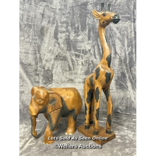 44 - Carved wooden Giraffe, 78cm high with a carved wooden Elephant 33cm high / AN6