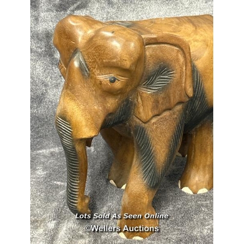 44 - Carved wooden Giraffe, 78cm high with a carved wooden Elephant 33cm high / AN6