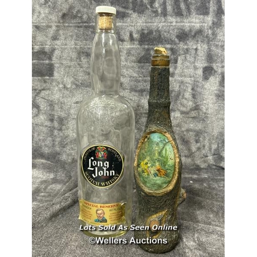 54 - Large empty Long John Scotch Whisky bottle with an empty wine bottle covered with paper mache to loo... 