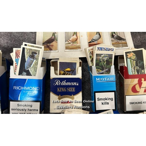 77 - A large collection of Brooke Bond tea cards in cigarette boxes, including some complete sets and spa... 