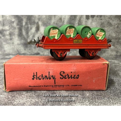 105 - Three Hornby 0 gauge barrel wagons no. RS691 each with four wooden Castrol Oil barrels, one boxed / ... 