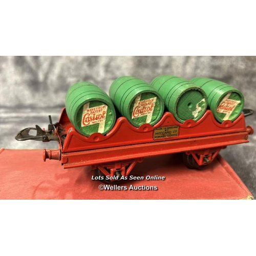 105 - Three Hornby 0 gauge barrel wagons no. RS691 each with four wooden Castrol Oil barrels, one boxed / ... 