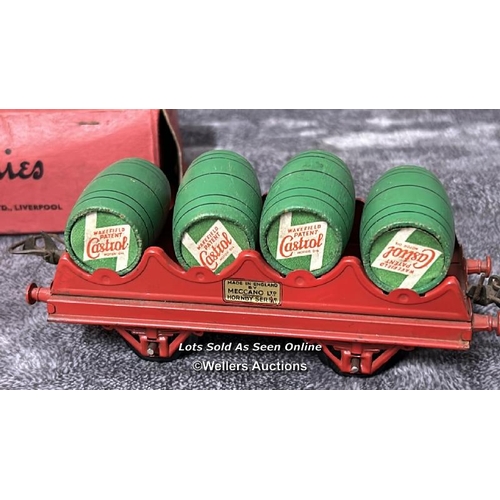 105 - Three Hornby 0 gauge barrel wagons no. RS691 each with four wooden Castrol Oil barrels, one boxed / ... 