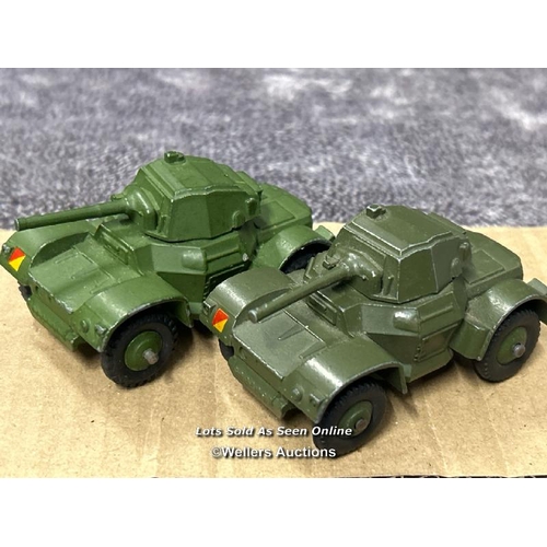 109 - Two Dinky armoured cars no.670, both different shades of green, with ridged hubs, unboxed / AN18