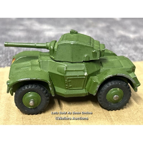 109 - Two Dinky armoured cars no.670, both different shades of green, with ridged hubs, unboxed / AN18