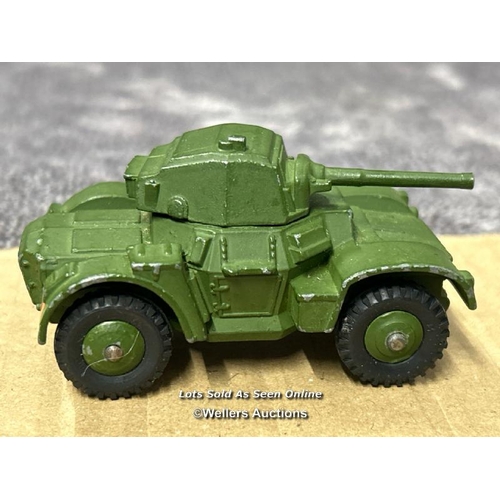 109 - Two Dinky armoured cars no.670, both different shades of green, with ridged hubs, unboxed / AN18