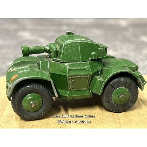 110 - Dinky armoured car no.670, green body, ridged hubs and short gun. Early model without box / AN37