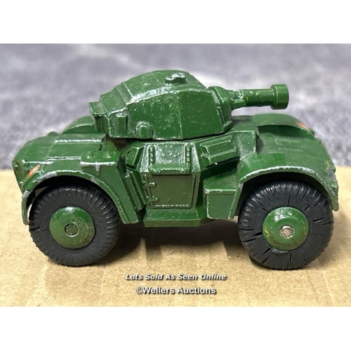 110 - Dinky armoured car no.670, green body, ridged hubs and short gun. Early model without box / AN37