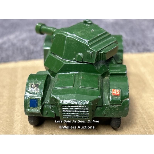 110 - Dinky armoured car no.670, green body, ridged hubs and short gun. Early model without box / AN37