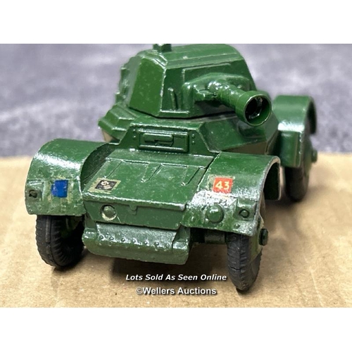 110 - Dinky armoured car no.670, green body, ridged hubs and short gun. Early model without box / AN37