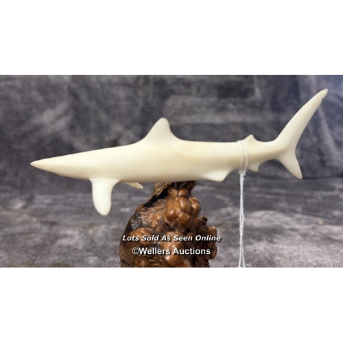 100 - A ceramic Shark figurine on wooden base by John Perry, 17cm high / AN17