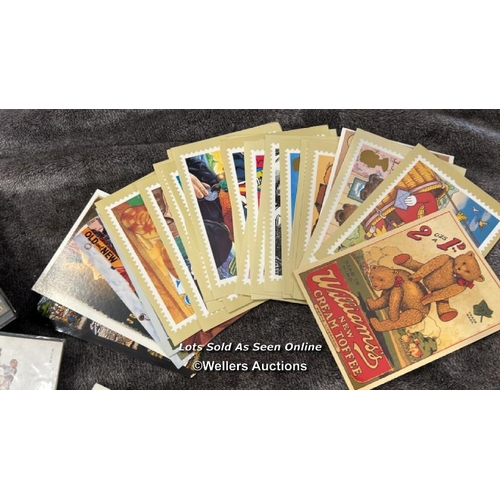 103 - A large collection of sealed British 1st day covers (approx 94) with stamped envelopes and postcards... 