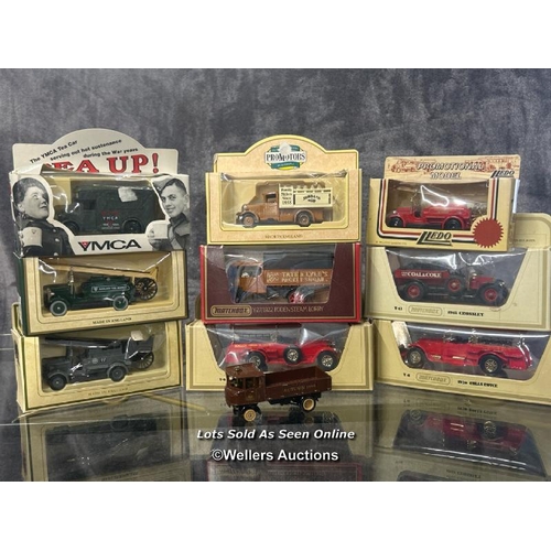 125 - Assorted boxed Models of Yesteryear and Lledo trucks and fire trucks with one loose / AN20