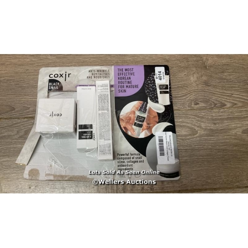 4014 - COXIR KOREAN BLACK SNAIL COLLAGEN FACIAL SET / APPEARS NEW IN DAMAGED PACKAGING / E2