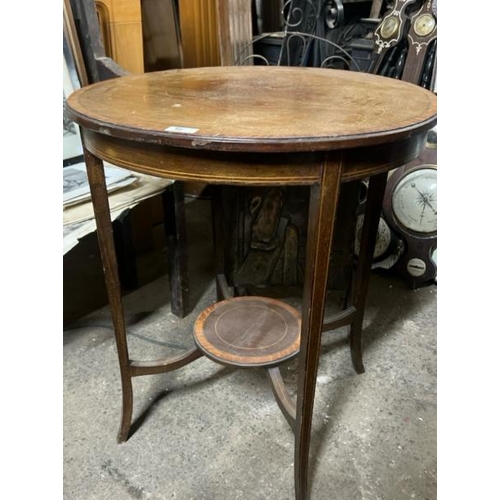 10 - An Edwardian inlaid occasional table in circular form, 72cm high x 60cm diameter