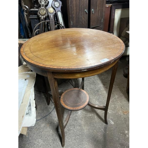 10 - An Edwardian inlaid occasional table in circular form, 72cm high x 60cm diameter