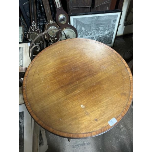 10 - An Edwardian inlaid occasional table in circular form, 72cm high x 60cm diameter