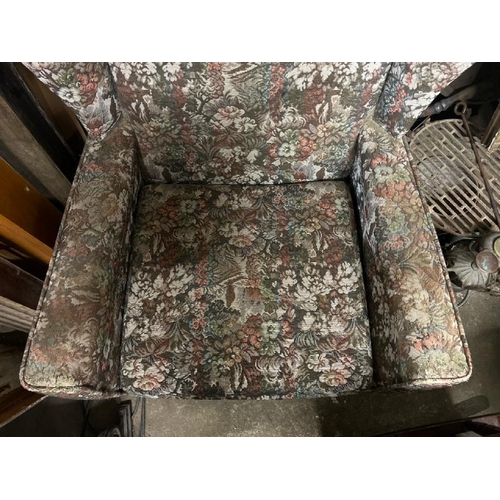 20 - A reproduction upholstered armchair, 110cm high x 70cm wide x 70cm deep