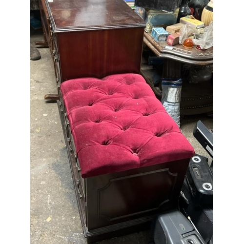 26 - A reproduction chest of six drawers with upholstered seat, 70cm high x 93cm wide x 39cm deep