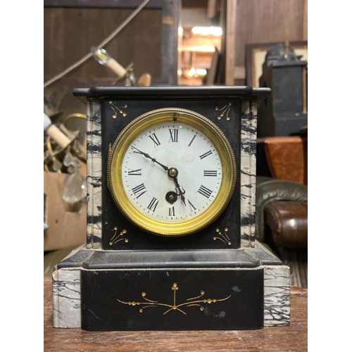 27 - A marble mantle clock, maker unknown, 20cm high x 19cm wide