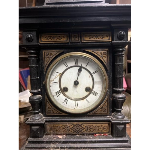 28 - A wooden mantle clock by 'Hall', 50cm high x 30cm wide x 15cm deep