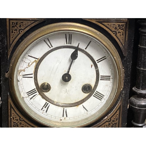 28 - A wooden mantle clock by 'Hall', 50cm high x 30cm wide x 15cm deep