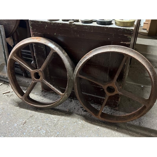 4 - A pair of heavy cast iron wheels, 50cm in diameter