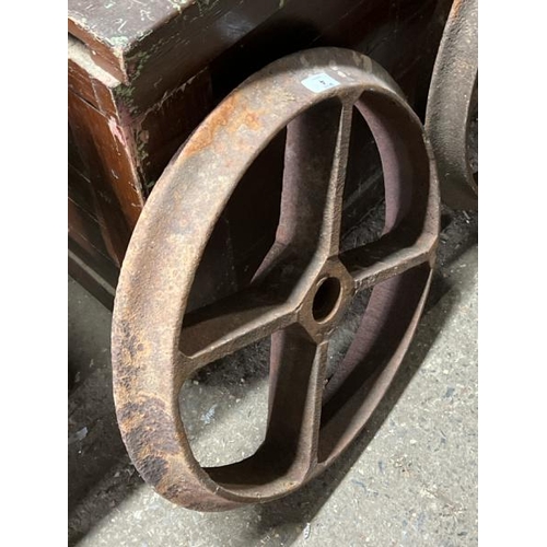 4 - A pair of heavy cast iron wheels, 50cm in diameter