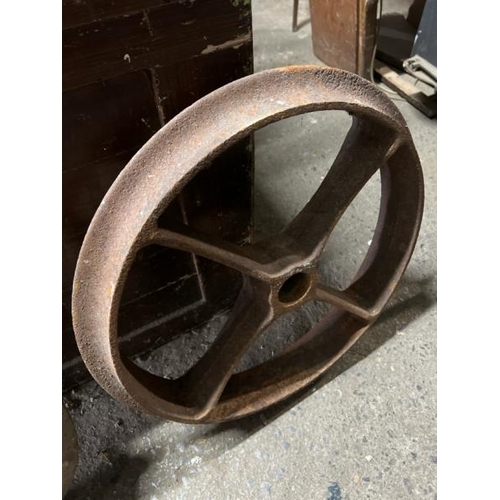 4 - A pair of heavy cast iron wheels, 50cm in diameter