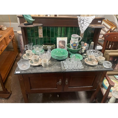 44 - A Victorian two door dressing table, with green marble top and decorative inset tile backing, not in... 