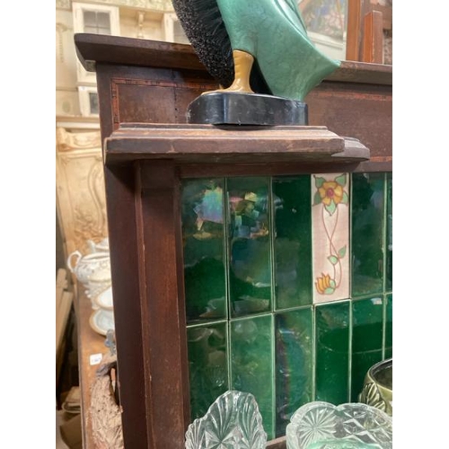 44 - A Victorian two door dressing table, with green marble top and decorative inset tile backing, not in... 