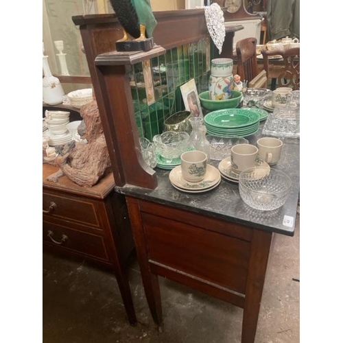 44 - A Victorian two door dressing table, with green marble top and decorative inset tile backing, not in... 