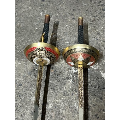 5 - A pair of ornamental fencing swords, 108cm long