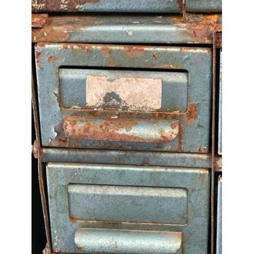 51 - A vintage metal storage cabinet, with fixty eight drawers but missing two, 103cm high x 73cm wide x ... 