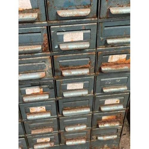 51 - A vintage metal storage cabinet, with fixty eight drawers but missing two, 103cm high x 73cm wide x ... 