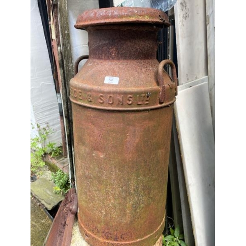 54 - An old metal milk churn by S. Reece & sons ltd, 75cm high