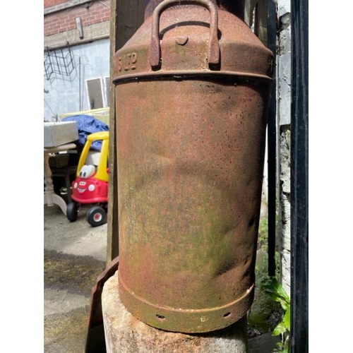 54 - An old metal milk churn by S. Reece & sons ltd, 75cm high