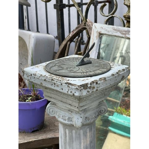 60 - A reconstituted stone sundial, 84cm high