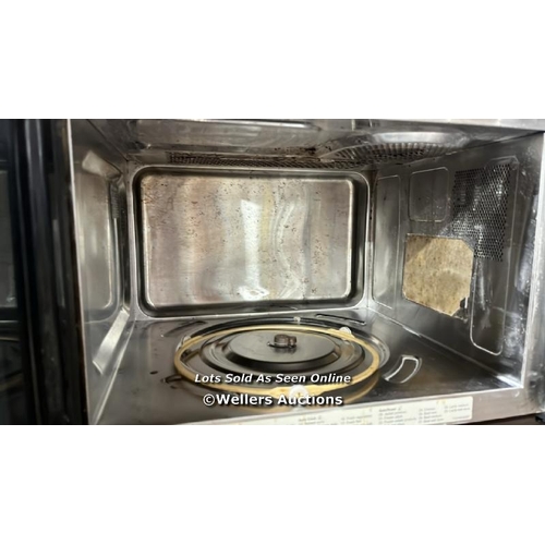 6040 - PANASONIC NN-CT56JBBPQ COMBI MICROWAVE / APPEARS FUNCTIONAL / POWERS UP / HEAVY SIGNS OF USE / A39