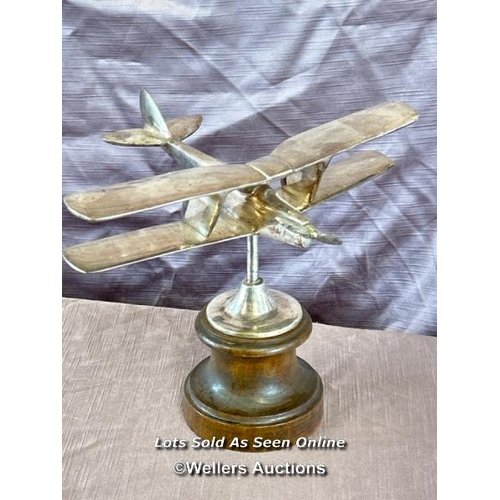 100 - Heavy chrome Bi-Plane model on trophy base, 20cm high  / All lots are located at The Barn, Hampstead... 