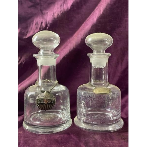 19 - Near pair of decants with Sherry badges, tallest 27cm (h)  / All lots are located at The Barn, Hamps... 