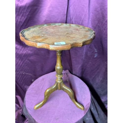 390 - A small occasional table with walnut pie crusted top and mahogany triform base, 50cm (h) x 35cm (dia... 