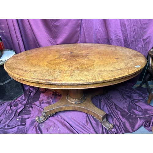 396 - 19th century oval shaped walnut dining table on scroll carved quadform base, 74cm (h) x 137cm (w) x ... 