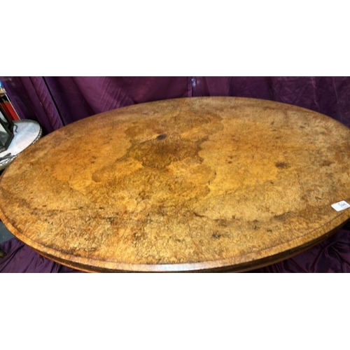 396 - 19th century oval shaped walnut dining table on scroll carved quadform base, 74cm (h) x 137cm (w) x ... 