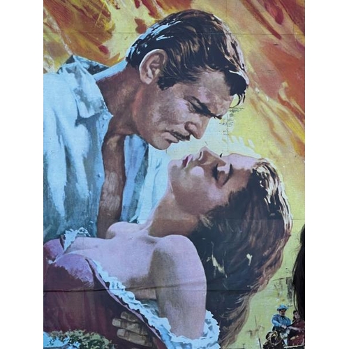 424 - An original 'Via Col Vento' film poster on board, featuring Clark Cable and Vivien Leigh  / All lots... 