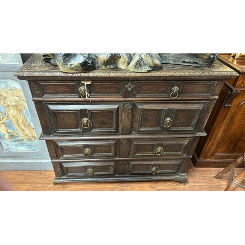 467 - A Jacobean style oak chest of four drawers  / All lots are located at The Barn, Hampstead Farm, Nr H... 