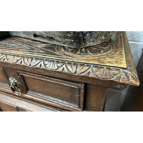 467 - A Jacobean style oak chest of four drawers  / All lots are located at The Barn, Hampstead Farm, Nr H... 