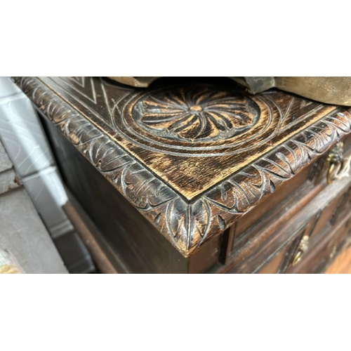 467 - A Jacobean style oak chest of four drawers  / All lots are located at The Barn, Hampstead Farm, Nr H... 