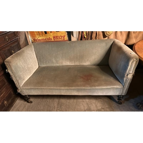 469 - Early 20th century upholstered sofa on fluted mahogany legs with original casters, 75cm (h) x 145cm ... 